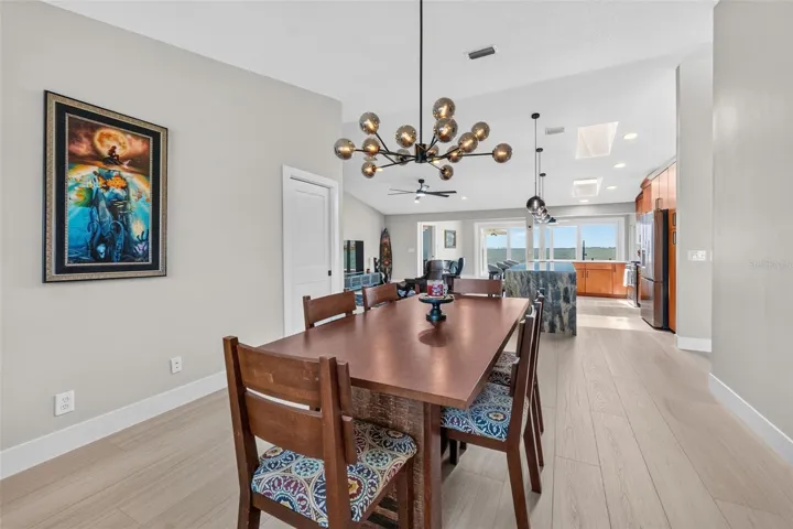 Spacious dining room with easy access to a walk-in pantry, perfect for hosting dinners and everyday meals.