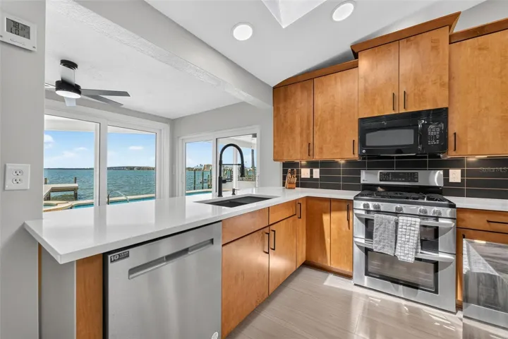 Beautiful quartz countertops on the kitchen perimeter