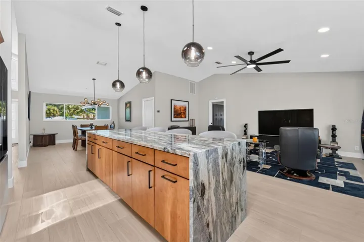 Seamless open-concept design connects the kitchen and family room, creating the perfect space for gatherings and everyday living.