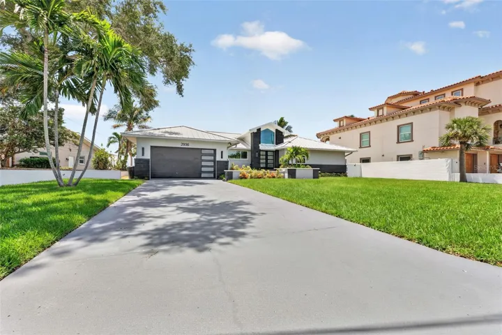 Spacious parking pad just painted & re-sealed with plenty of room for guests, boats, or an RV.