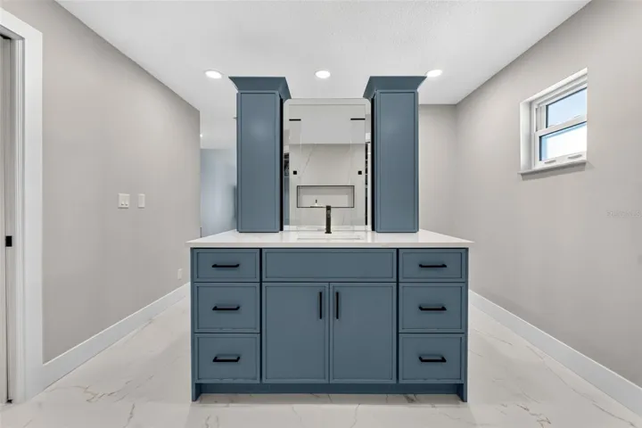 Beautiful primary bathroom dual vanity with abundant storage.