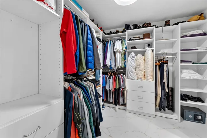 Custom closet systems by Closets By Design throughout the home