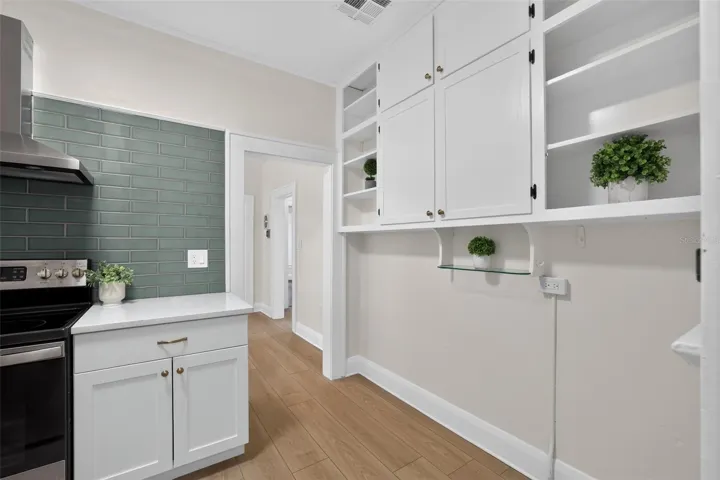 Updated 1922 bungalow kitchen featuring quartz countertops and solid wood cabinetry