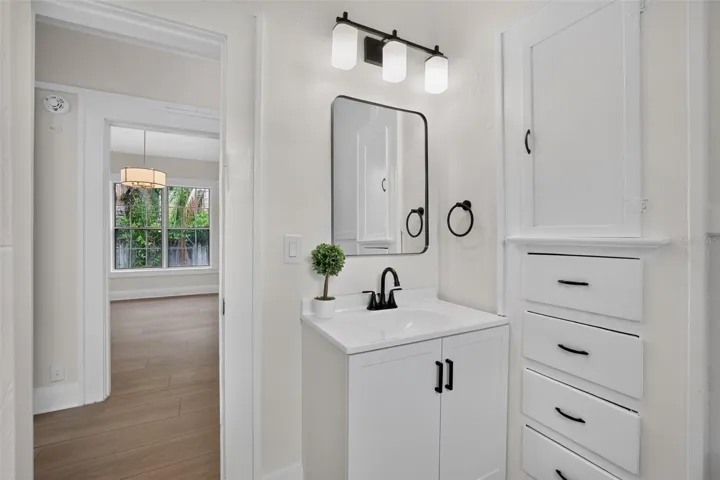 Classic 1922 bungalow bathroom with updated vanity and built-in storage