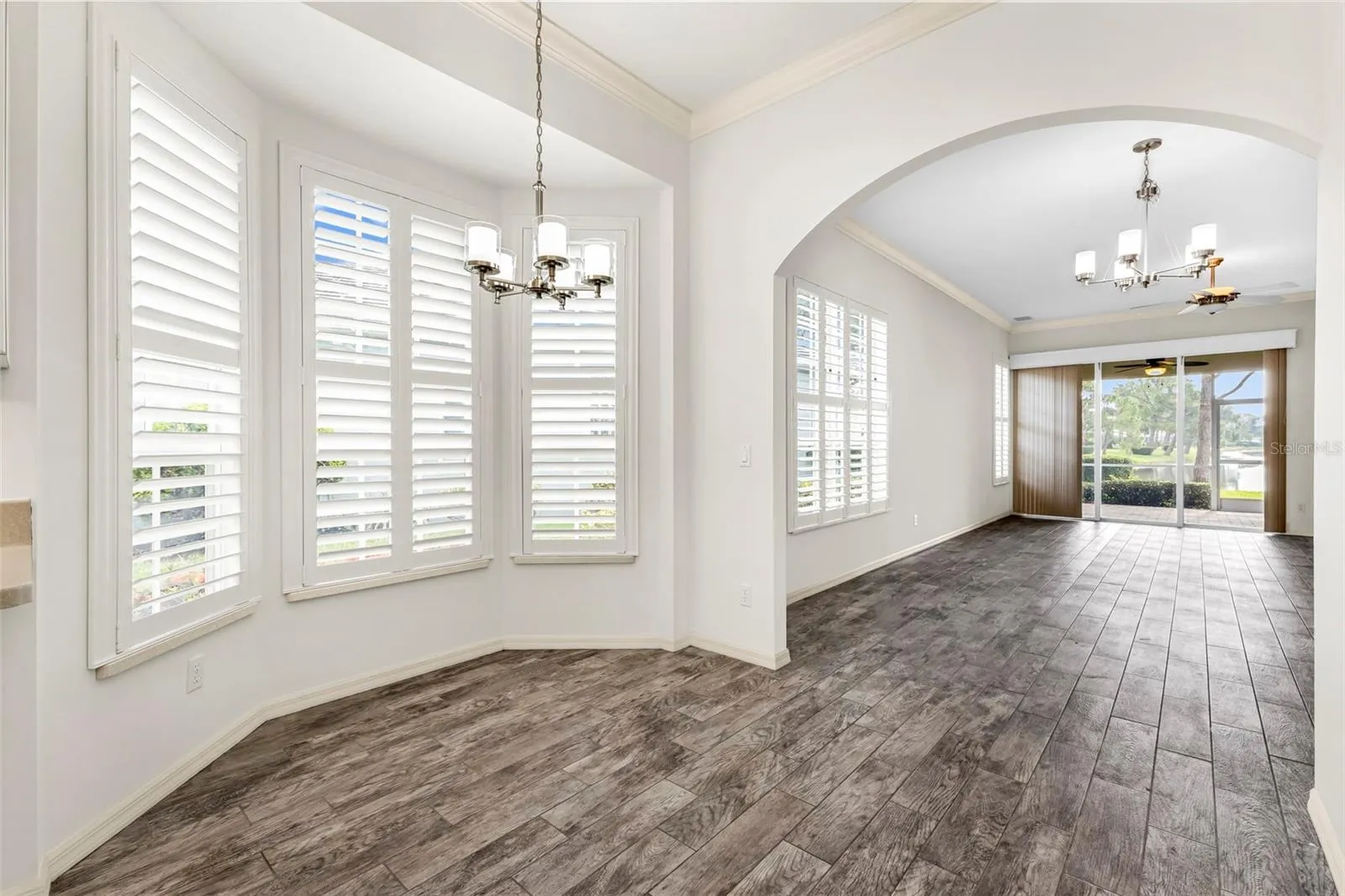 Breakfast nook opens up to the dining/living room area.