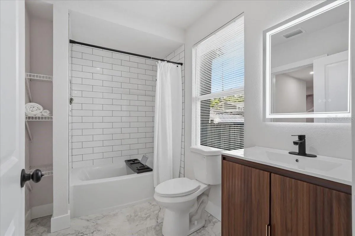 Guest Bath with access to bedroom 2 and hall