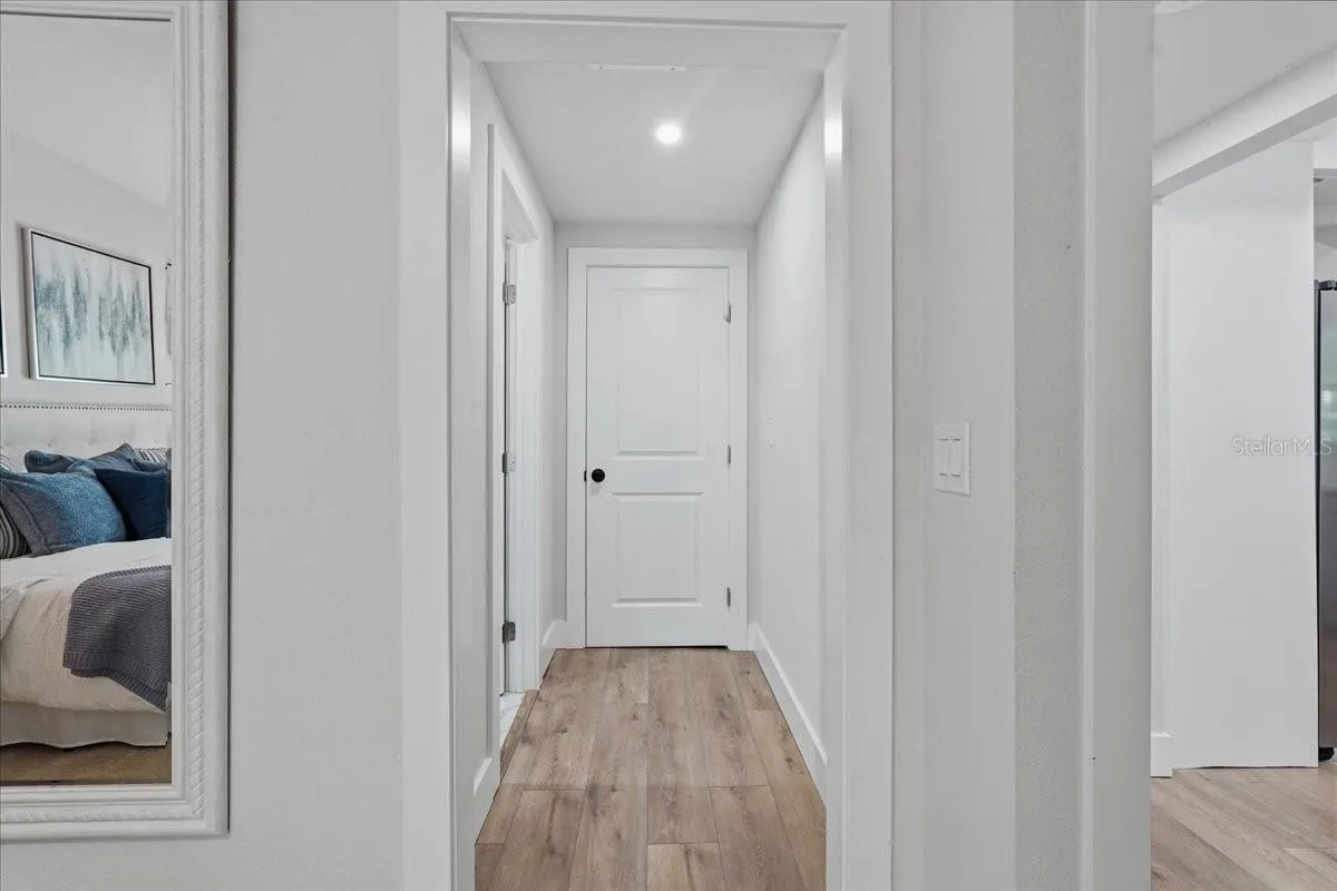 Hall to primary bath and second closet