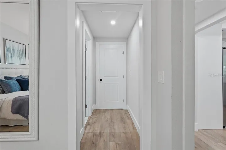 Hall to primary bath and second closet