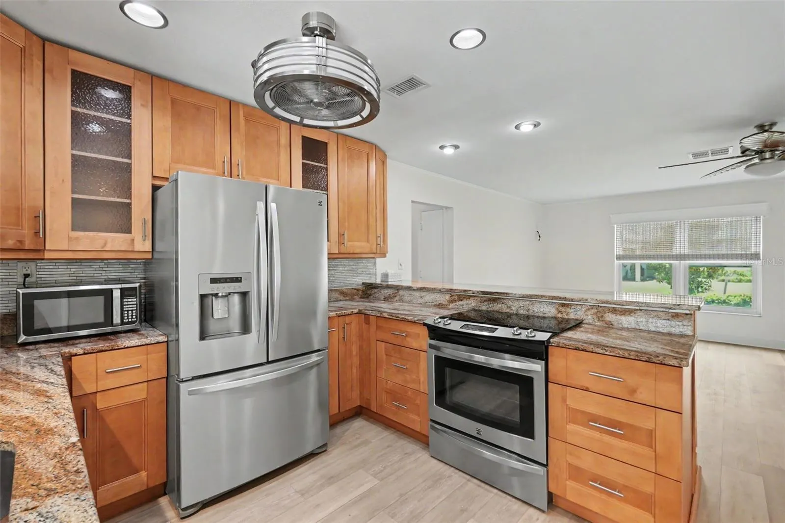 Kitchen has 42" upper cabinets for full use of the space