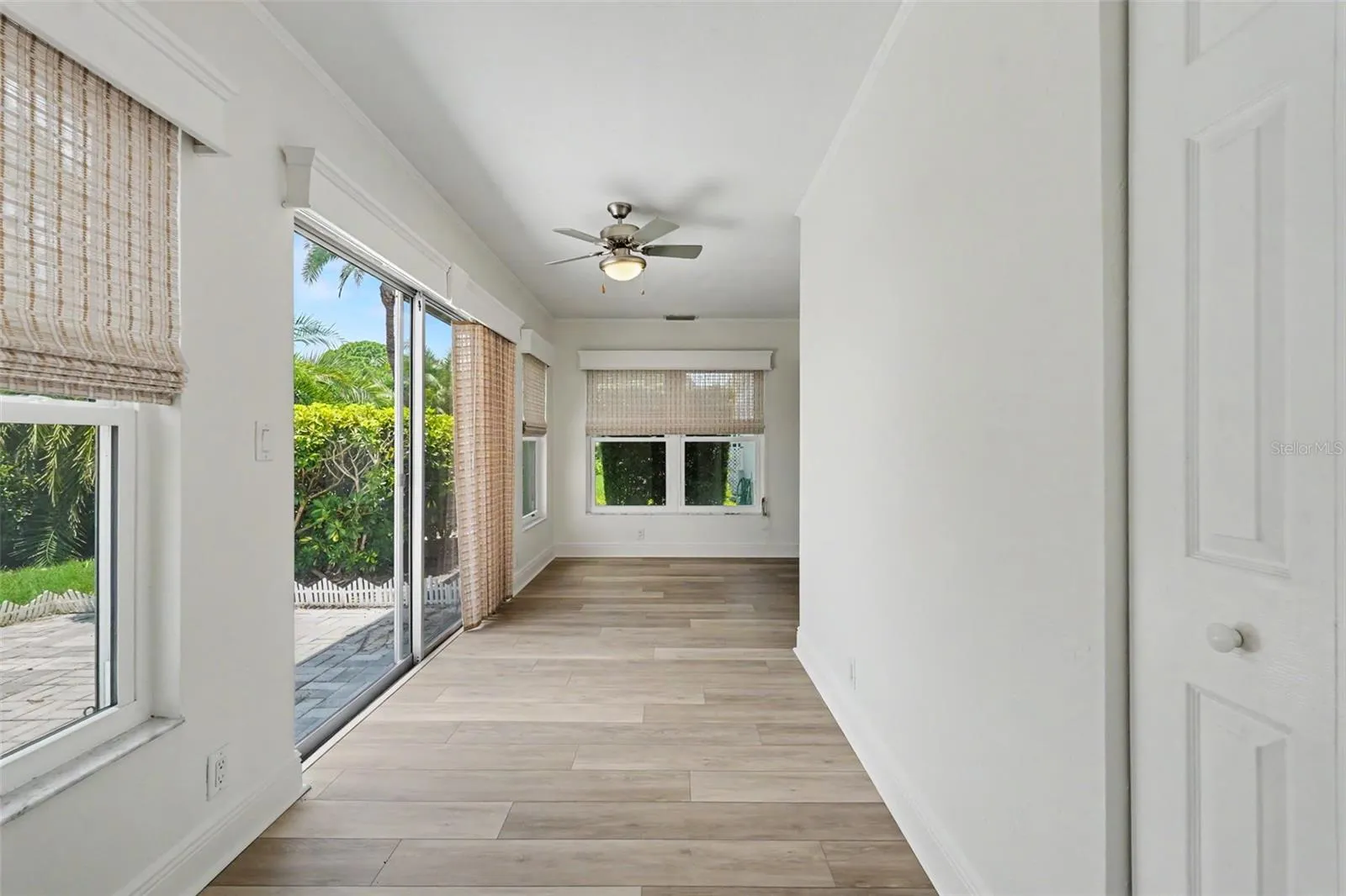 Bonus Room/Sunroom opens to back paver patio