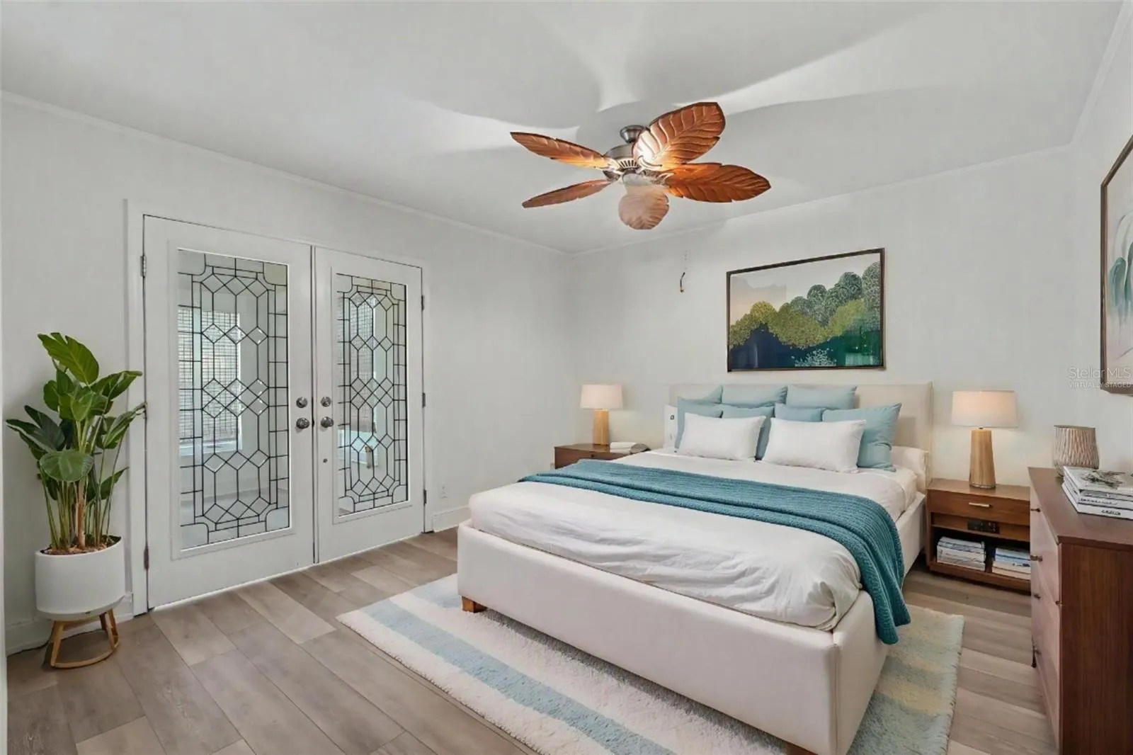 Virtually Staged Guest Bedroom w/doors to bonus room