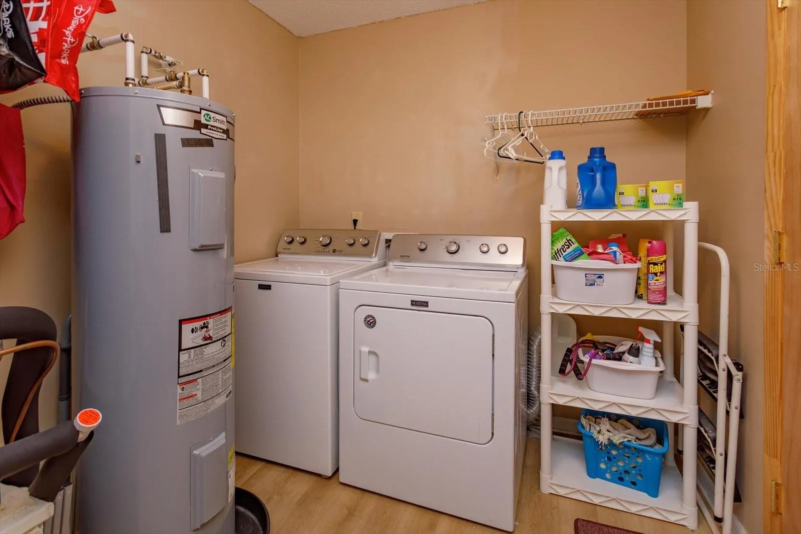 Laundry Room w/entrance to storage over garage