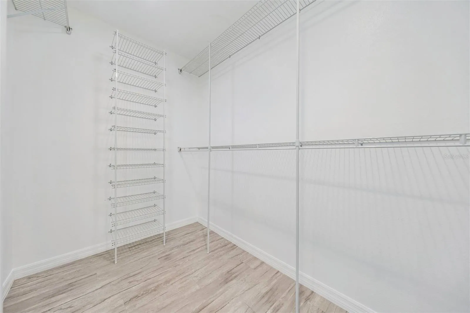 1 of 2 Large Walk-in Closets in Master