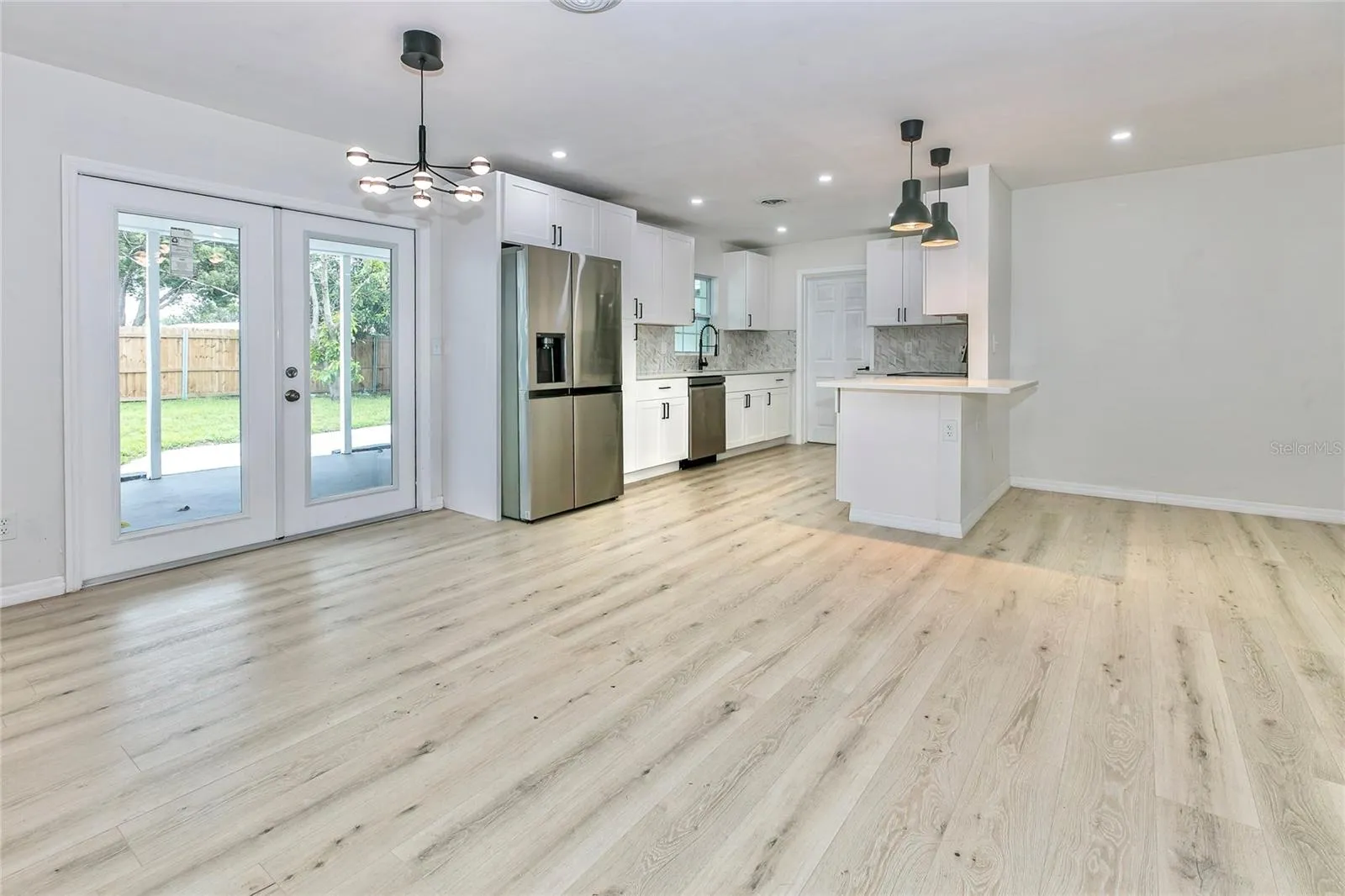 dining/kitchen and rear entrance door.