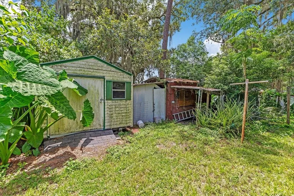 Back yard with sheds