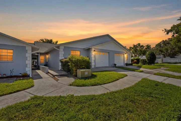 Bright and spacious 2-bedroom, 2-bath villa offering over 1,300 square feet of low-maintenance living in a convenient Trinity location.