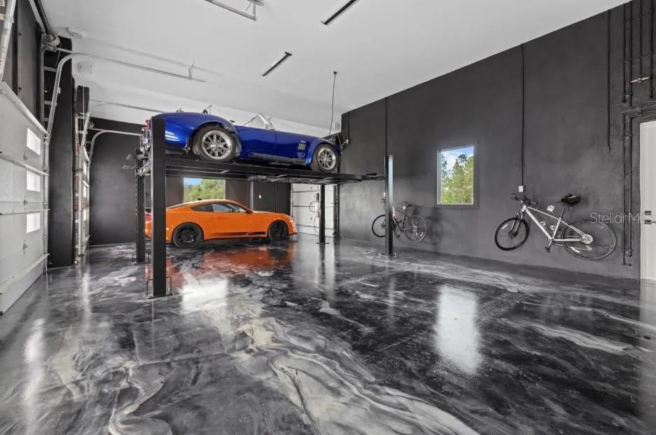 Left Side 3 Car Garage plus Lift - 4 Total