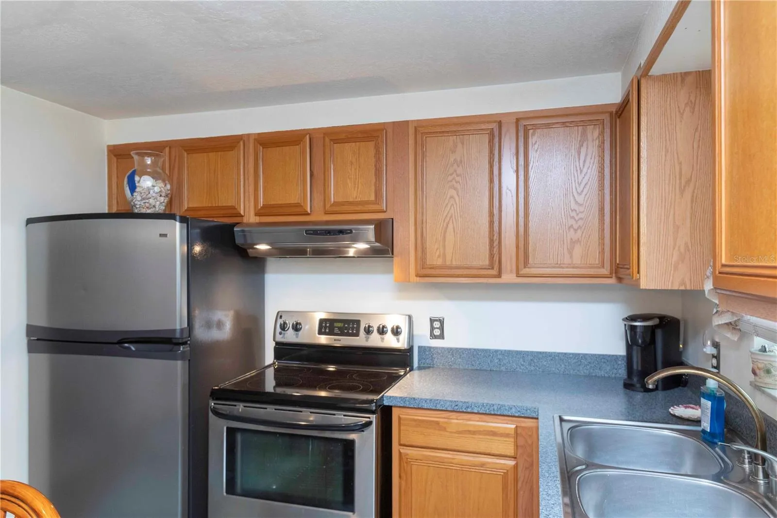Cute Kitchen with Stainless Steel Appliances