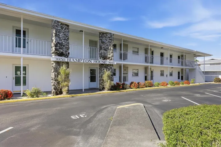 Exterior with assigned parking right in front of unit