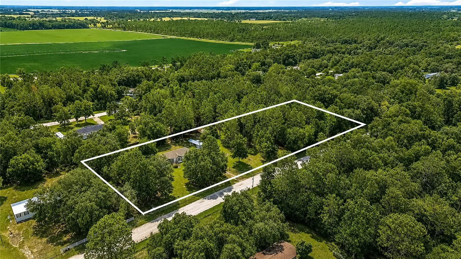 2 Gorgeous Acres of land to meet all your wants and needs.