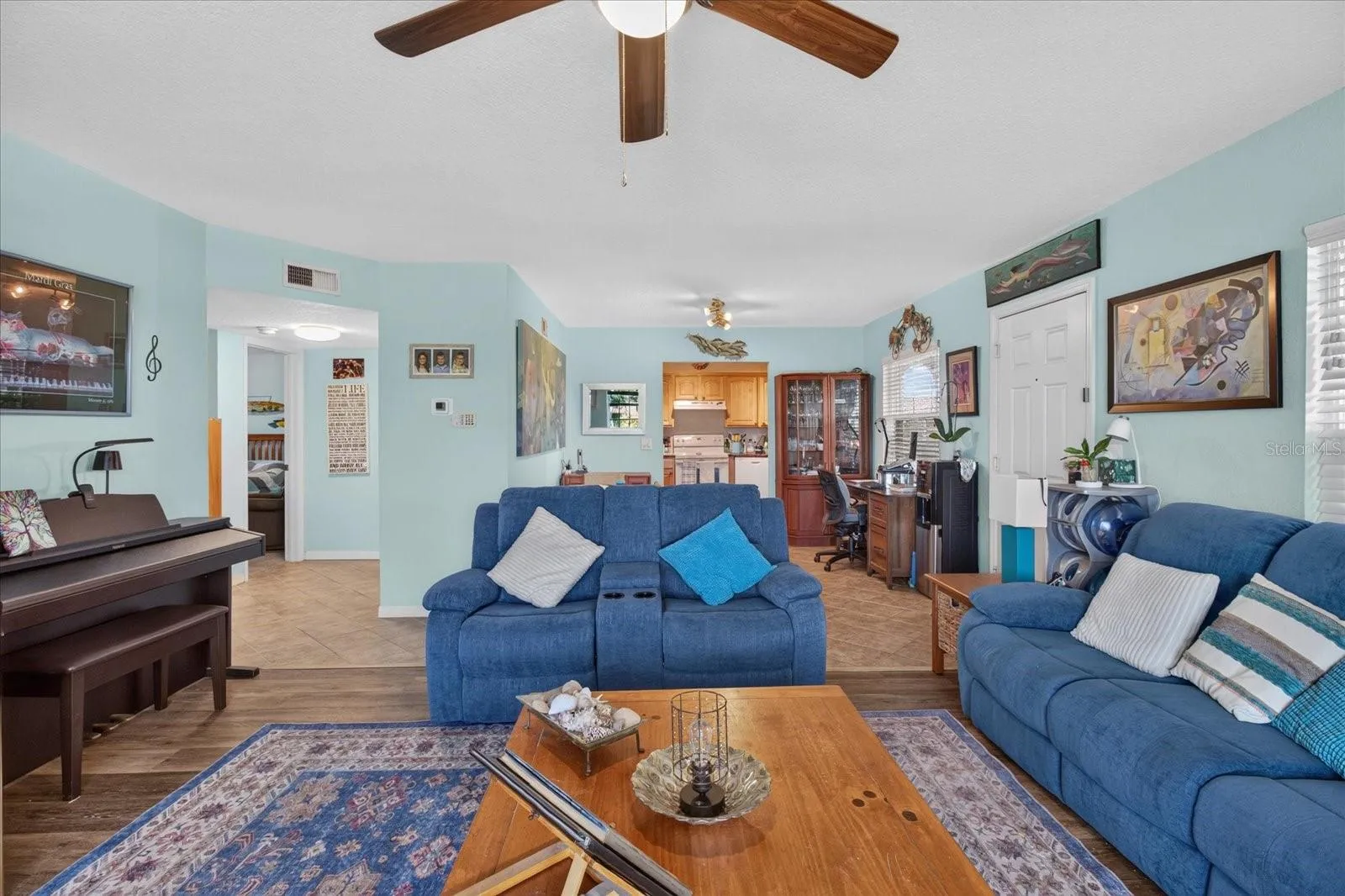 Living Room With Luxury Vinyl Plank and Impact Windows Installed in 2025