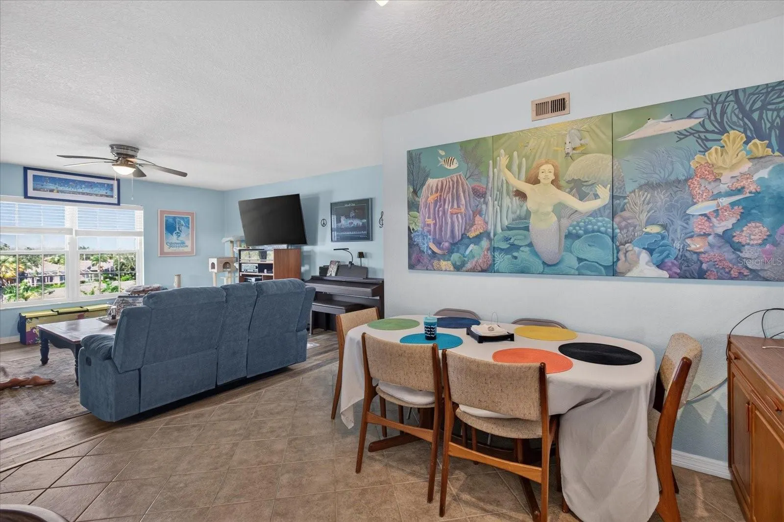 Dining Area That Leads to The Kitchen.Tile Floors In The Kitchen & Dining Area