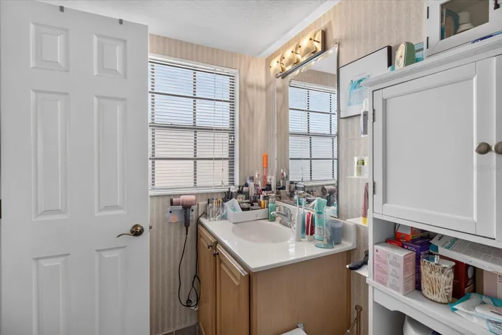 Primary Bathroom With A Tub/Shower Combo