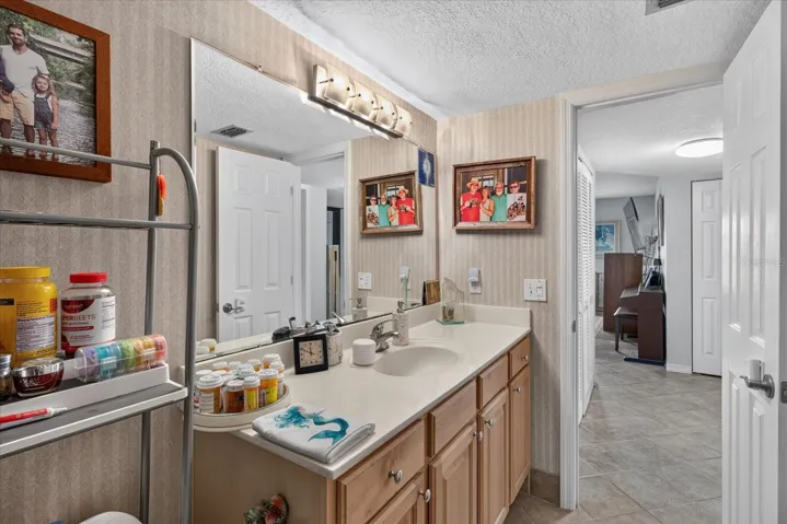Secondary Hall Bath With Walk In Shower & A Wide Vanity