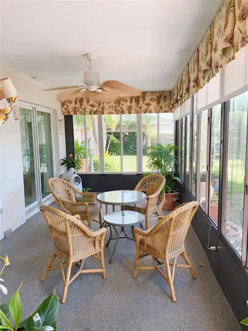 Lanai Staged  looking out over the Lake /  with Pull Down Sun Screens