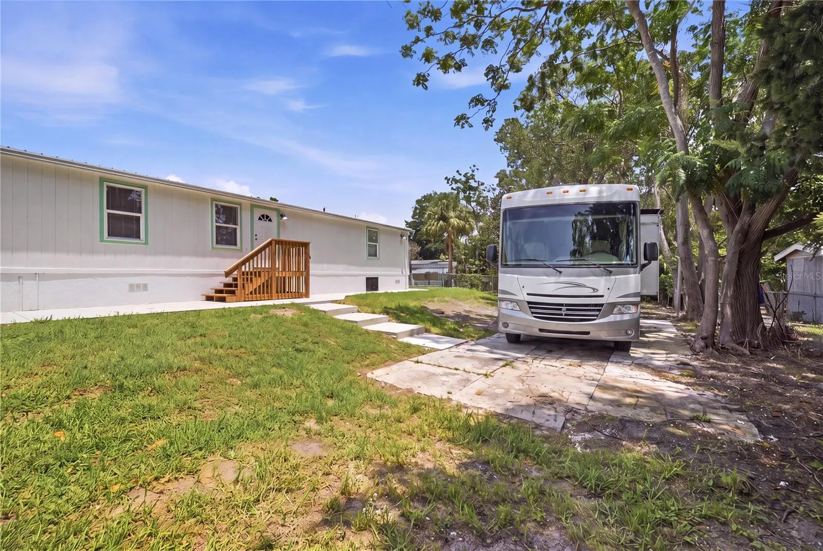 long concrete pad in backyard