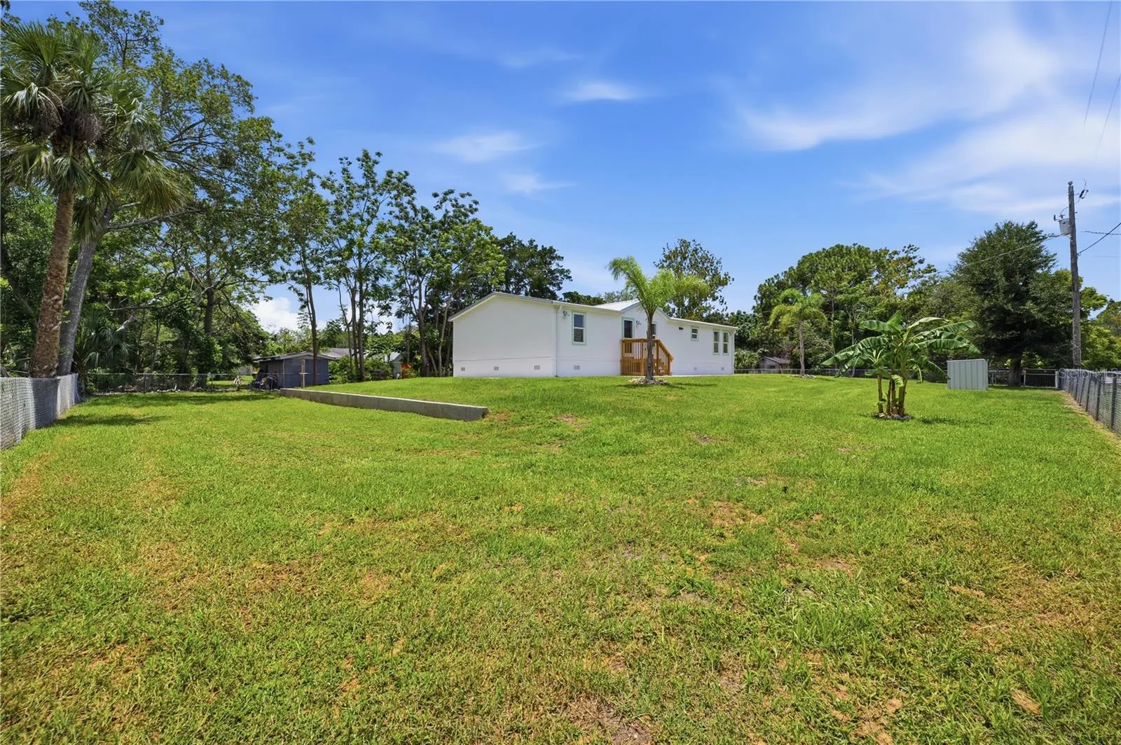 beautifully maintained 1/2 acre