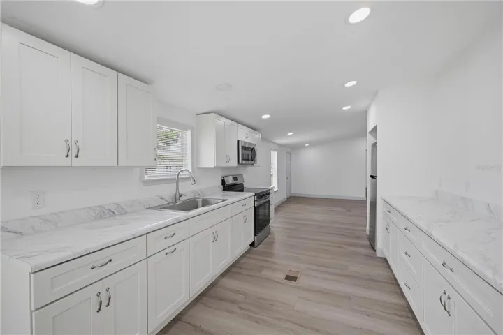 kitchen with lots of counter space and cabinets