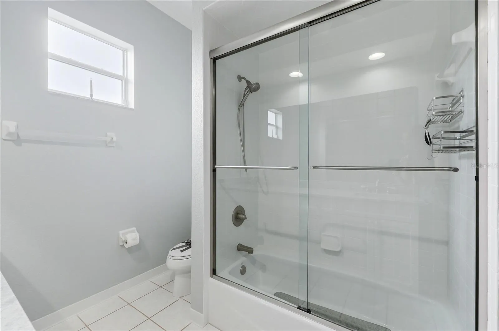 Third Bath Tub has Sliding Doors