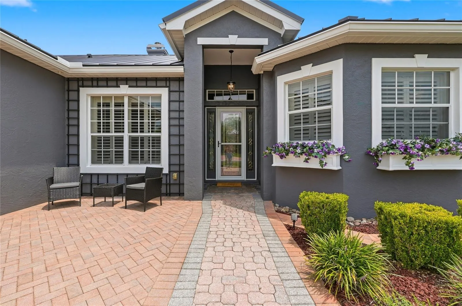 Welcoming Entry with Window Planter Boxes