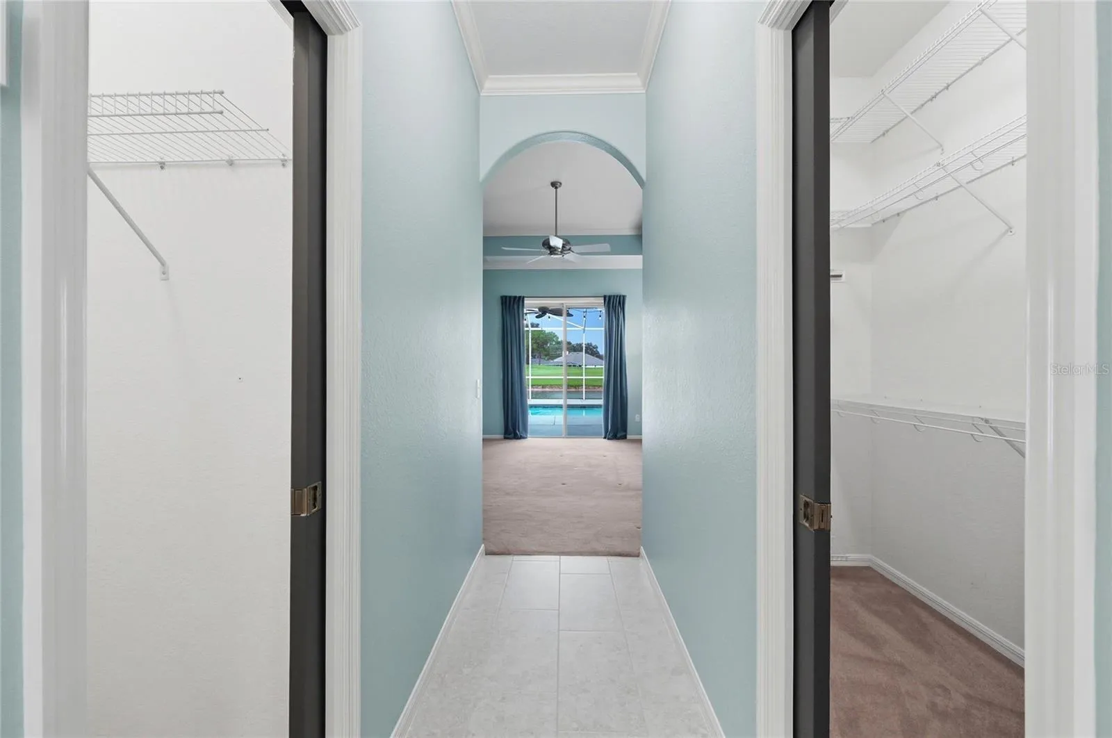 2 Walk-In Closets with Built-In Shelving