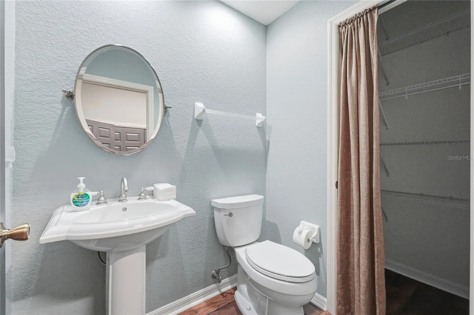 Powder Room with Storage Closet