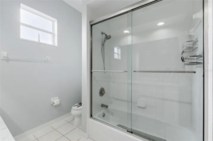 Third Bath Tub has Sliding Doors