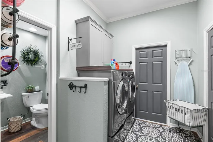 Kitchen Closet Pantry on Right & Door to Garage Straight Ahead