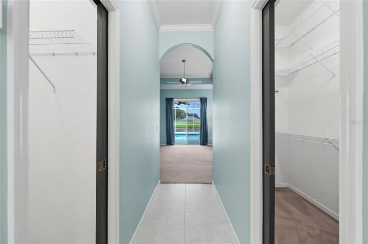 2 Walk-In Closets with Built-In Shelving
