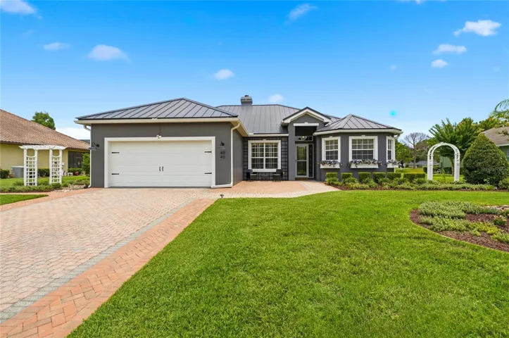 Paver Driveway & Lush Lawn