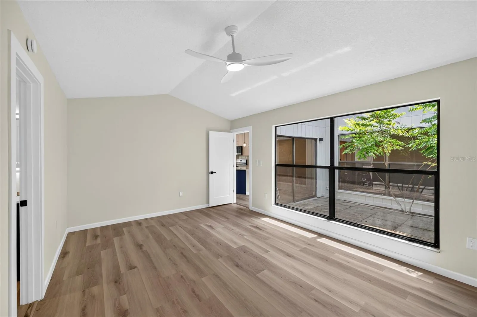 Large window in the master bedroom