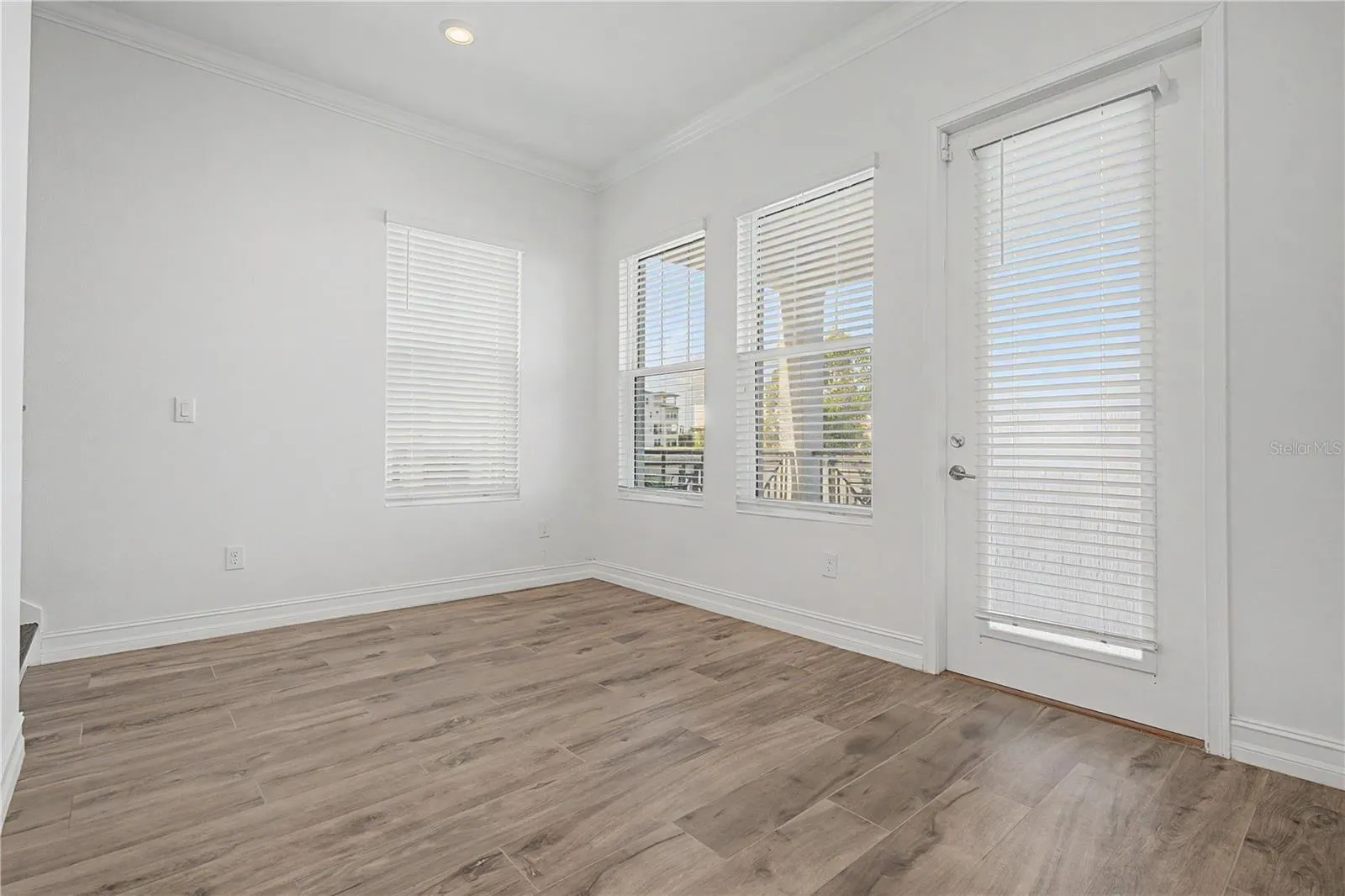 First-level living area with direct access to the outdoor patio and beautiful waterfront views.
