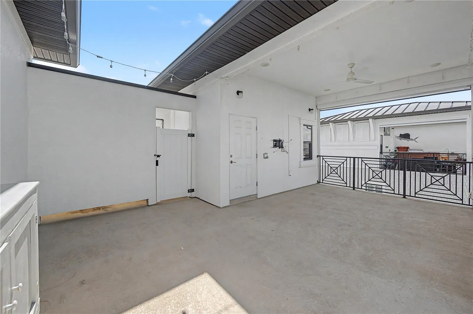 Fourth-level outdoor patio seating area.