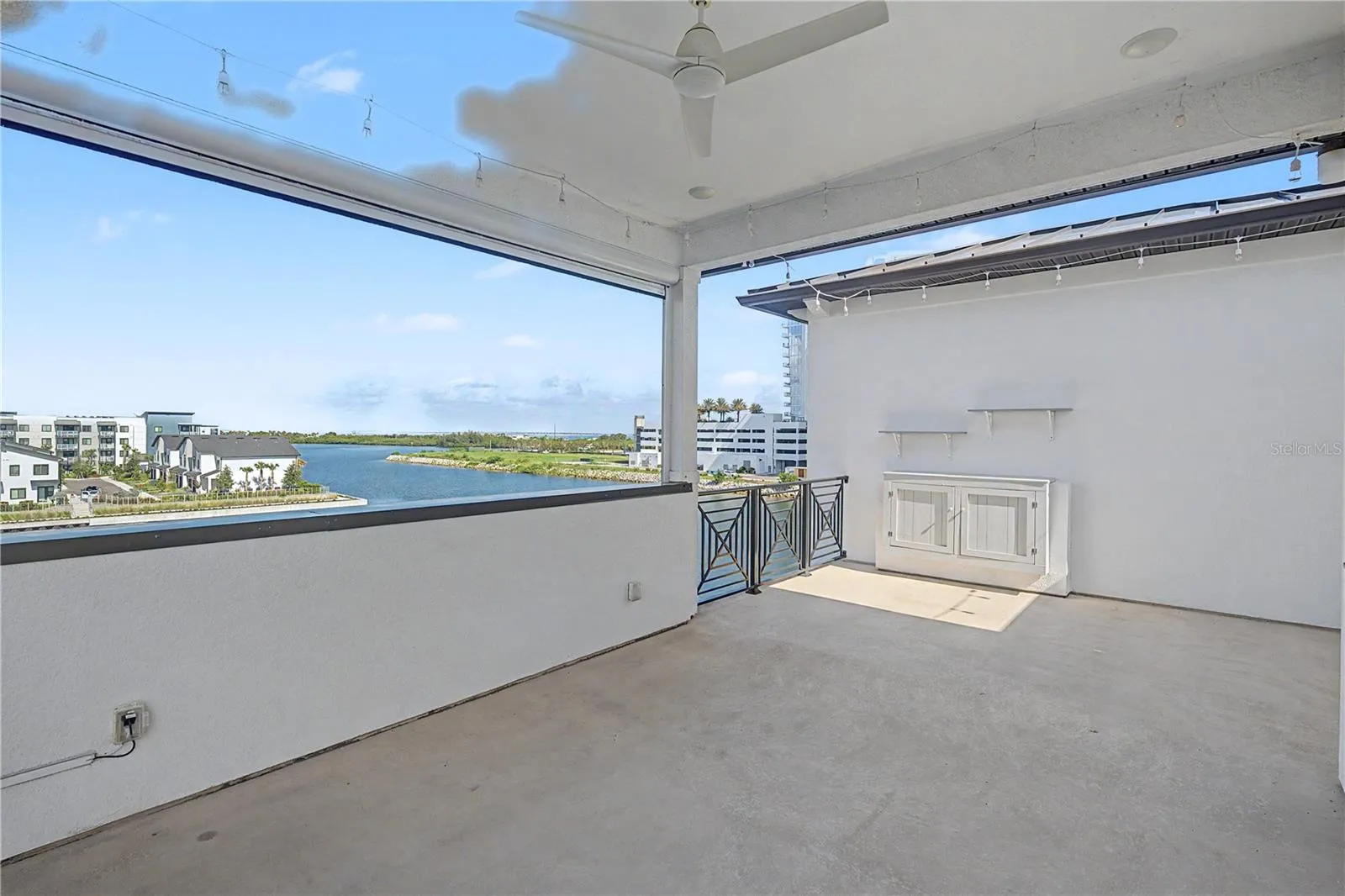 Fourth-level private patio offering a front-row seat for possible dolphin sightings.