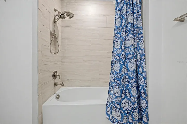 Third-level bathroom featuring a convenient tub/shower combination.