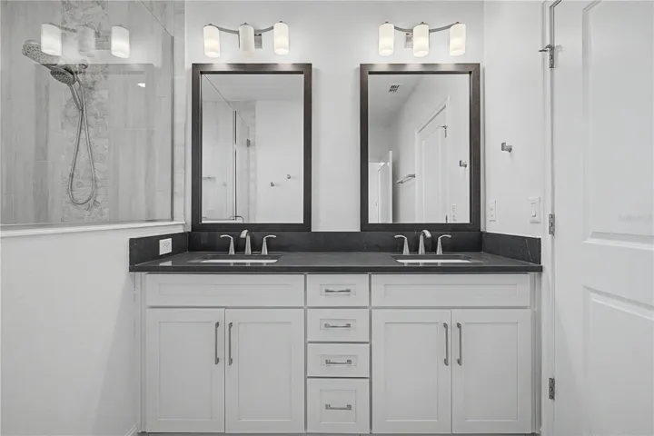 Third-level, master bath with double sinks.