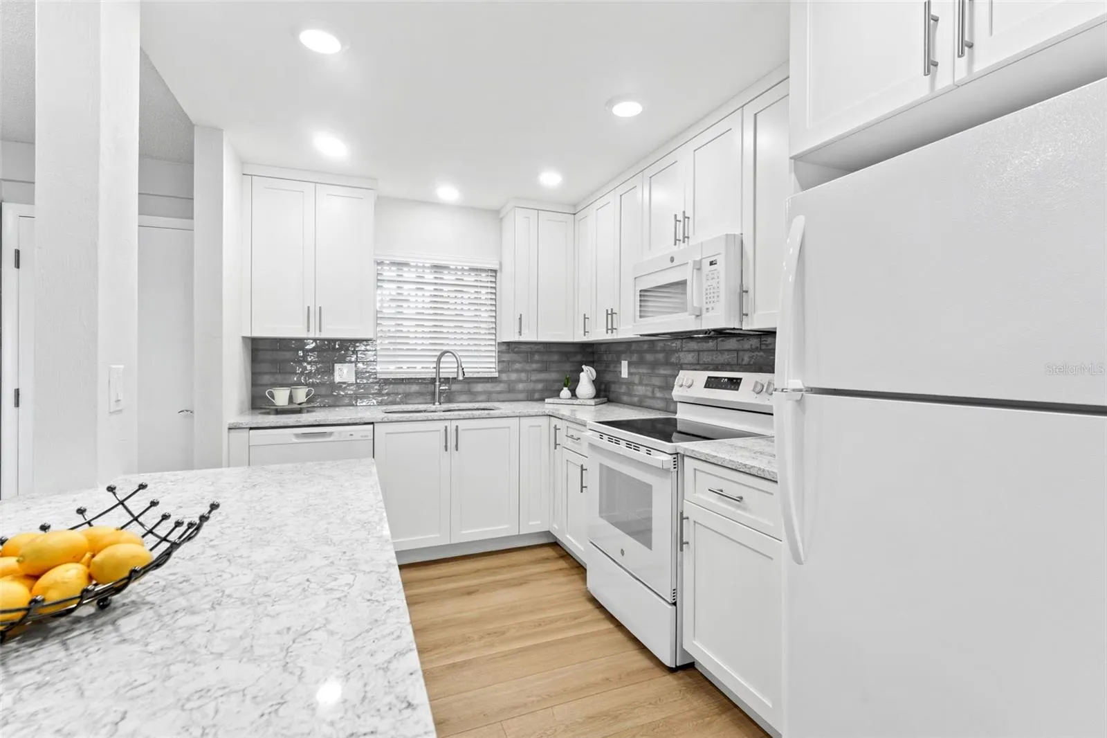 Cambria quartz countertops throughout.