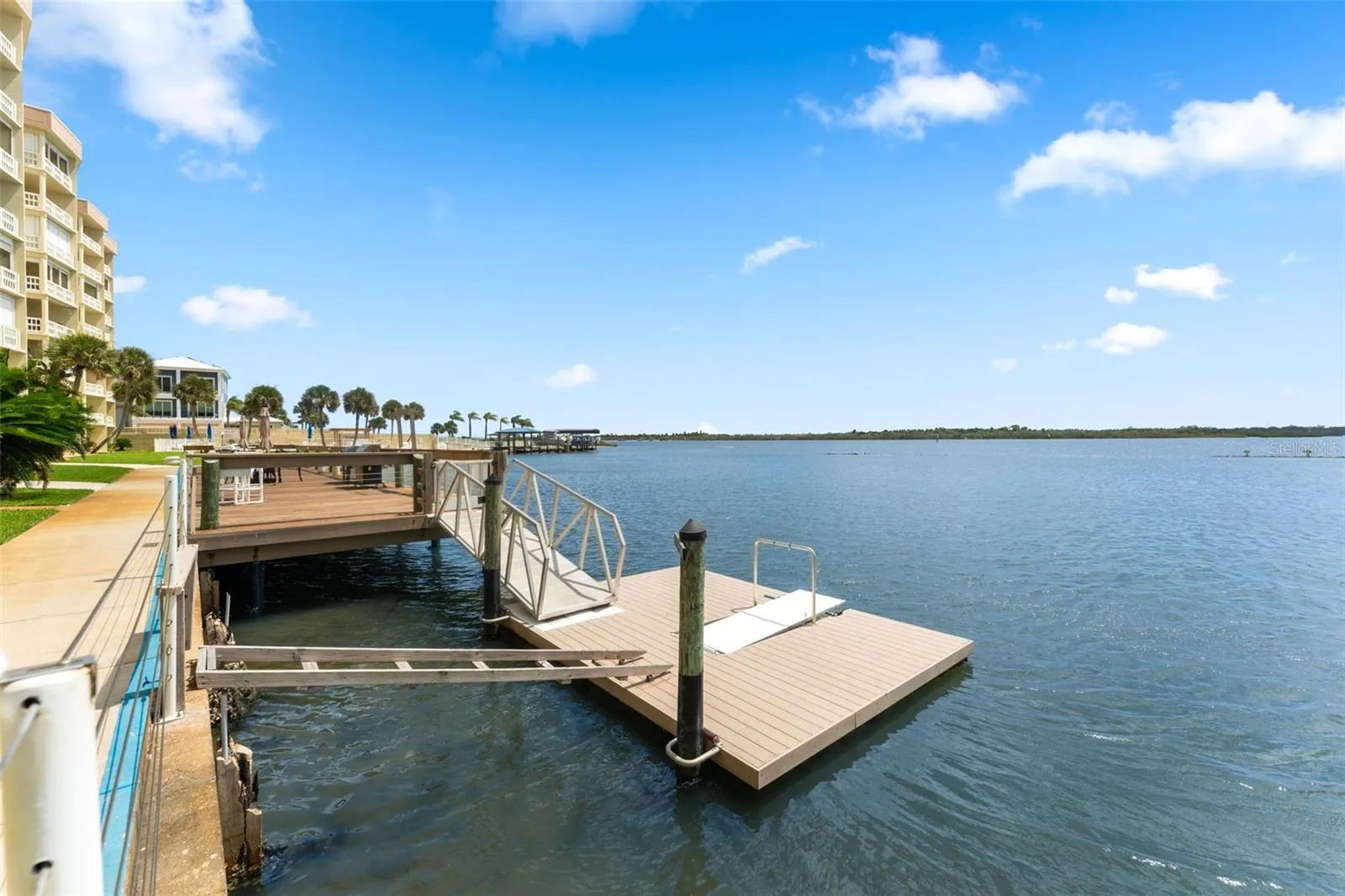 Floating dock launch for kayaks, canoes and other water toys