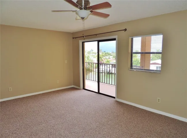 Living Room with Sliders to Private Balcony