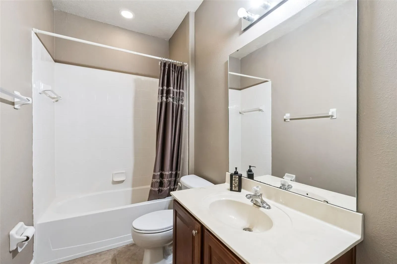 Full bathroom with tub and shower